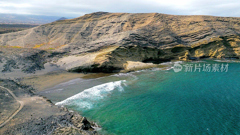 Aerial view of "Pelada" beach at the natural reserve of "Monta?a Pelada" in Tenerife (Canary Islands). Drone shot